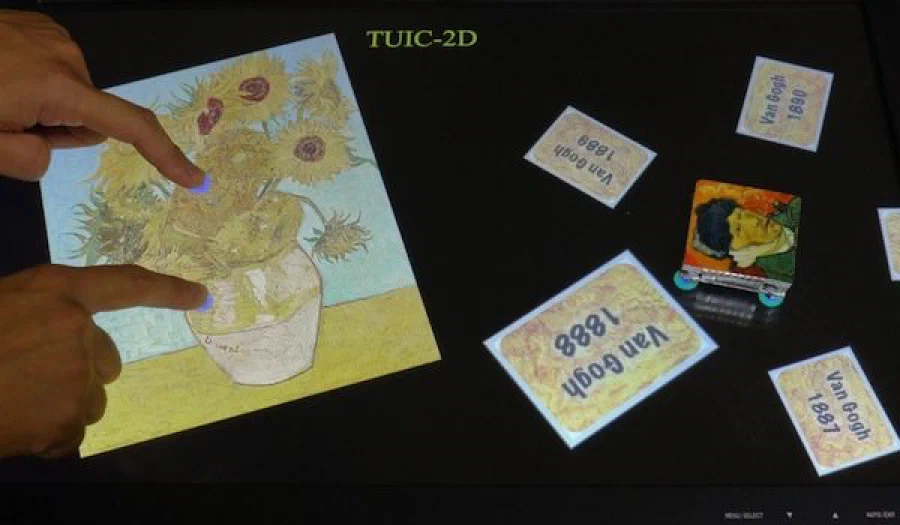 TUIC: enabling tangible interaction on capacitive multi-touch displays